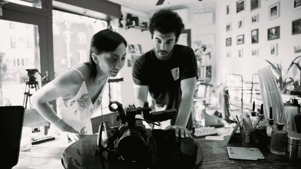 &W BTS photo of filming the Larry's film.